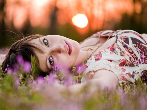 Beautiful Girl Outdoor Amazing Girl Lying On Grass And Flowers Snowy