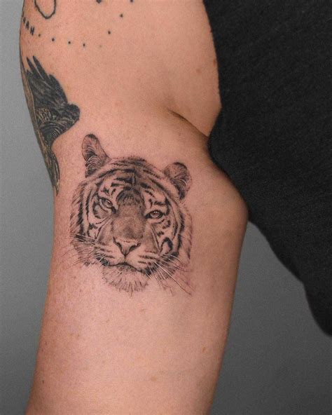 Tiger Head Tattoo Inked On The Right Arm Tiger Head