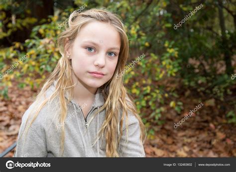 pre teen underwere pic sad blond preteen girl looking unhappy outside stock