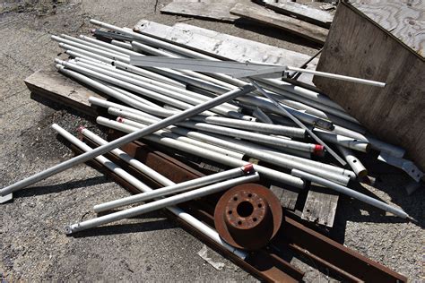 assorted aluminum poles