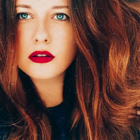 Beautiful Redhead Woman Red Lipstick Makeup Look And Wavy Long High