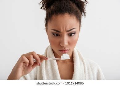 close young neat girl  toothpaste stock photo