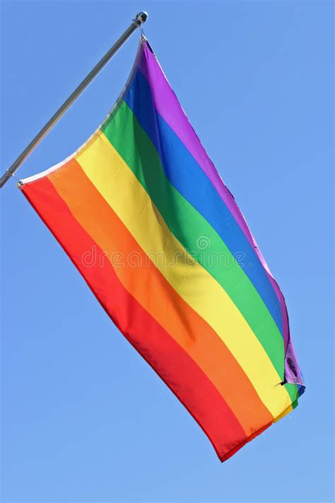 rainbow gay pride flag blue sky stock images download