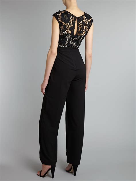 lipsy lace top jumpsuit in black lyst