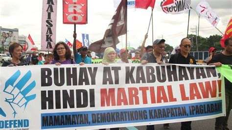 people protest against martial law and fascism on day of