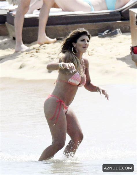 teresa giudice wows in a pink halterneck bikini while relaxing on the beach in mykonos aznude