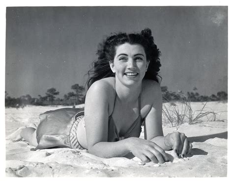 1940s a beach bunny enjoyed a sunny day in the sand a vintage day at the beach popsugar