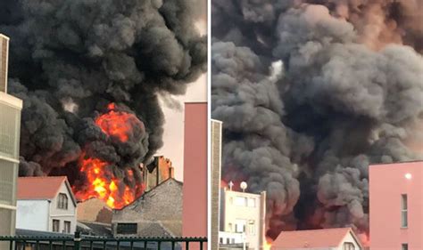 brussels fire molenbeek buildings in flames amid chaos in