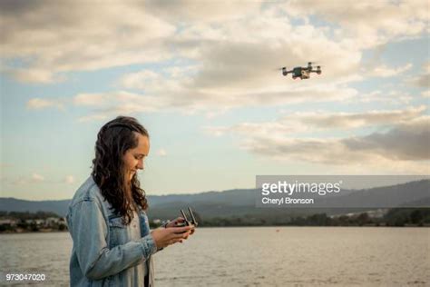 teenager flying drone   premium high res pictures getty images