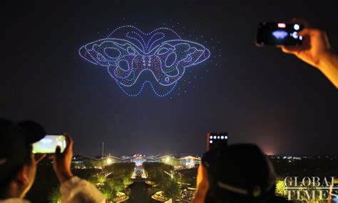 float parade  drone light show  display   china flower expo  shanghai global times