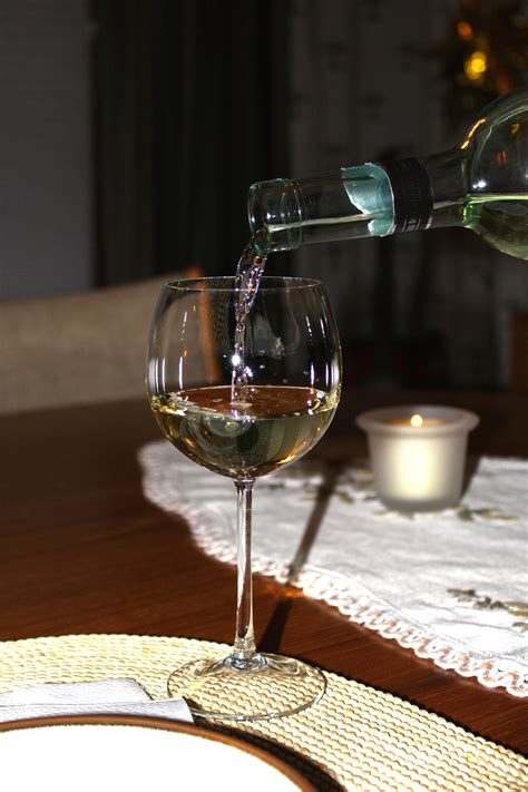 pouring white wine  high resolution photo  public domain