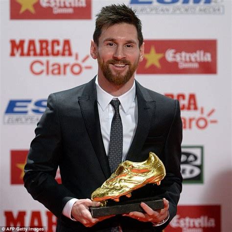 barcelona ace lionel messi receives golden shoe award from luis suarez