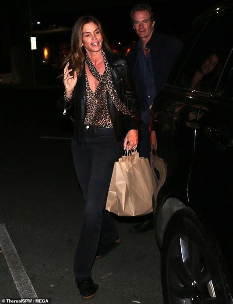 cindy crawford and rande gerber beam after dinner in