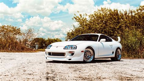 white toyota supra   backdrop  greenery wallpapers  images wallpapers pictures