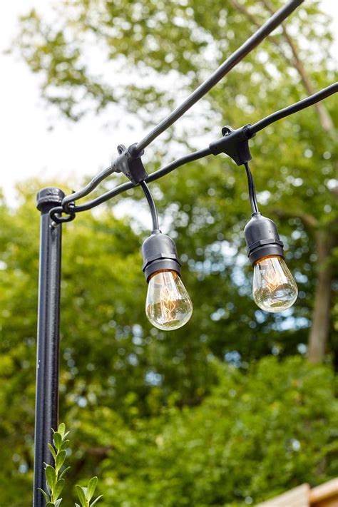 install poles  hang string lights   backyard  homes gardens