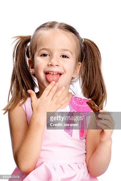 Girl Licking Finger Photos And Premium High Res Pictures Getty Images
