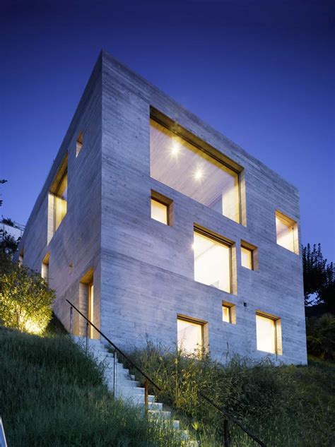 minimalist concrete home showcases stunning views  contemporary living