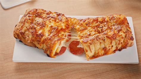 dominos  rolling     pepperoni stuffed cheesy bread