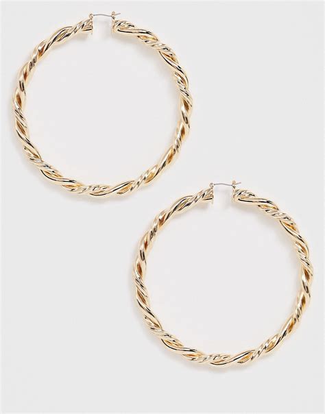 asos design mm hoop earrings  thick twist design  gold tone modesens