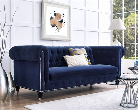 blue velvet tufted sofas