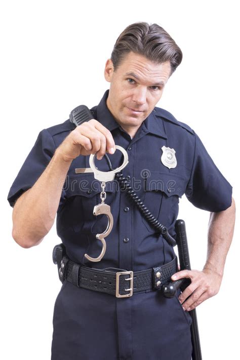 uniformed police officer holding handcuffs stock image image of handcuffs career 63843421