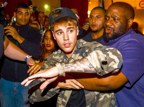 justin bieber punches photographer in paris see the photos e news
