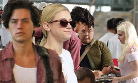 cole sprouse and lili reinhart seen at toronto airport on