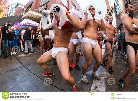 men wearing speedos act silly before atlanta santa speedo
