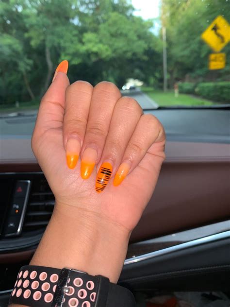 cute acrylic nail designs cute acrylic nails daniel ricciardo orange