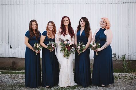 all of these bridesmaids wore navy in varying styles bridesmaid