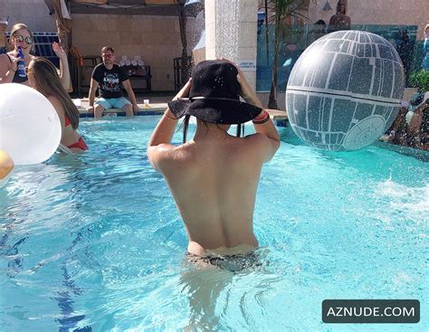 Tao Wickrath Topless While Partying At Strip Club Pool