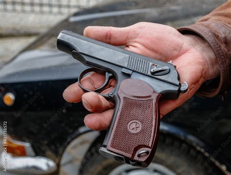 russian semi automatic makarov pistol   mans hand stock photo