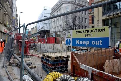 part  cross street reopens  traffic   city crossing work continues manchester