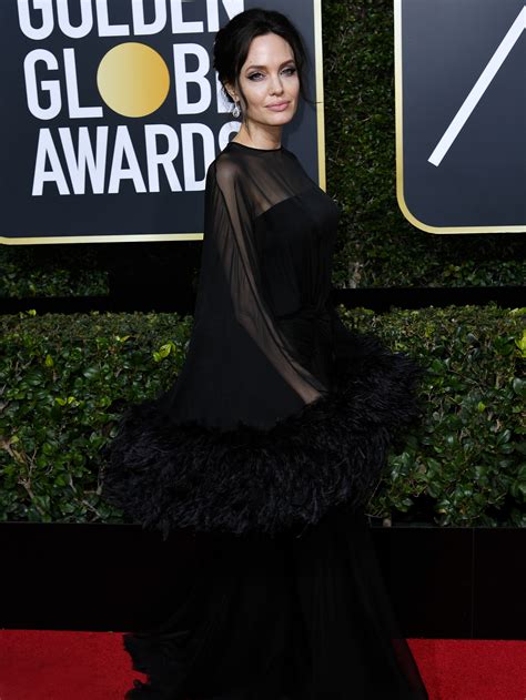 angelina jolie arrives at golden globes 2018 with unexpected date