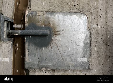 rod welded  galvanized steel plate embedded  concrete stock photo alamy