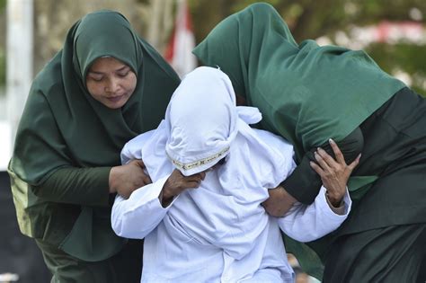 indonesia s aceh invokes islamic law and whips amorous couples