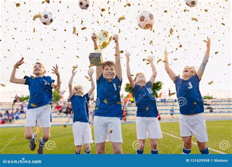 winning team raise trophy cup  digital background digital  stock photography