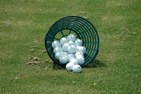 golf balls  driving range  stock photo public domain pictures