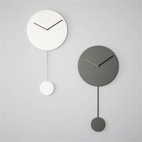wandklok minimal wit kunststof xxcm slingeruurwerk moderne klok en klok