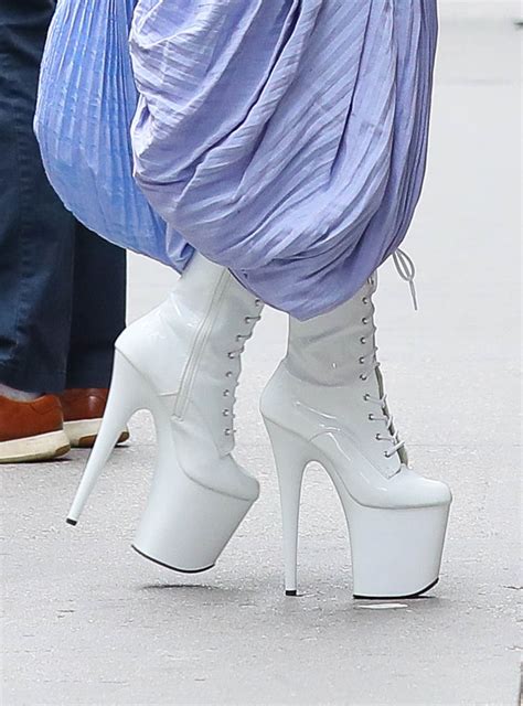 lady gaga s 9 inch heels and sculptural blue dress bring all the drama