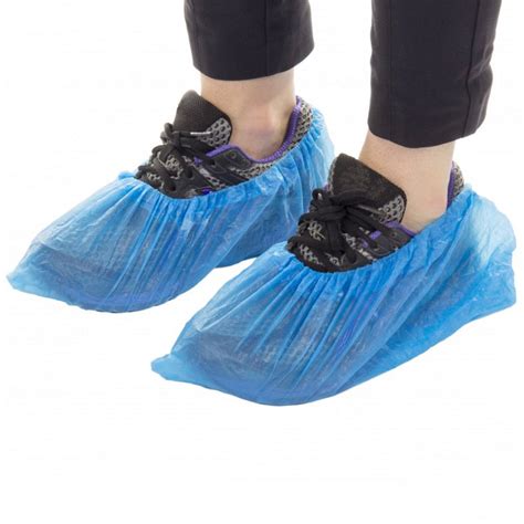 disposable shoe covers blue  size fits   ea pn blue ribbon supply