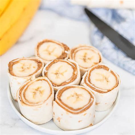banana peanut butter roll ups  school snack eating   dime