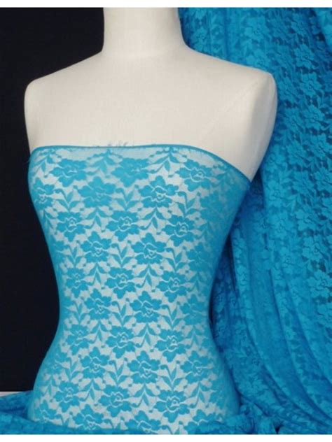 lace roses stretch fabric turquoise blue  tqbl