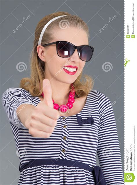 Beautiful Pinup Girl In Sunglasses Thumbs Up Stock Image