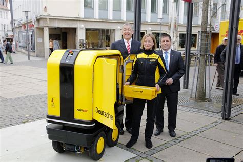 dhl postbot helps  postie carry  mail