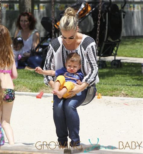 molly sims has her hands full carrying her adorable son brooks alan