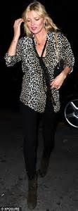 kate moss turns heads in plunging leopard print blouse in