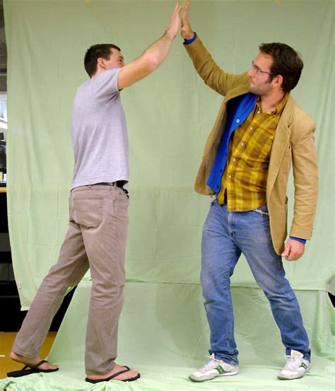 download two men giving high five pictures