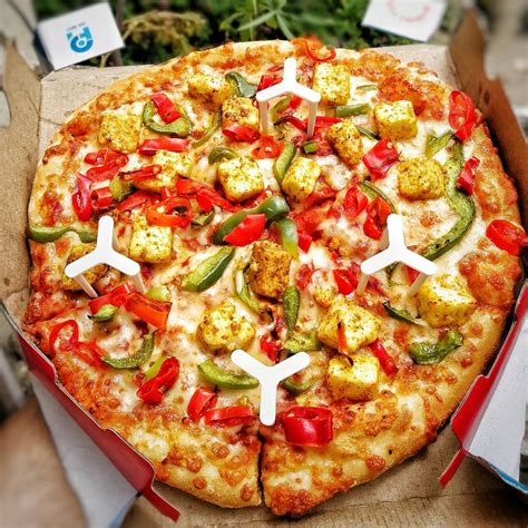 dominos pizza   major revamp expect tastier heartier pizzas foodelhi indias  food