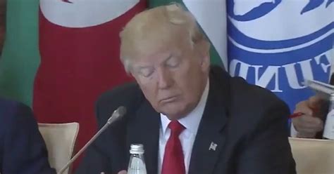 donald trump caught pretending to listen at g7 summit after crucial mistake gives him away